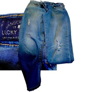 Lucky brand size 8/29 distressed jeans. Worn once. Great fit!